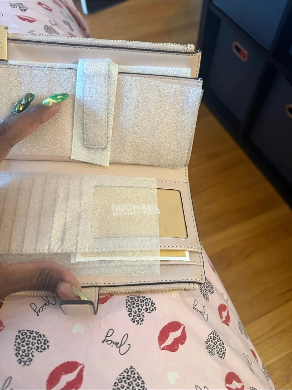 Michael Kors Pale Blush Pebbled Leather Wristlet with Gold Logo